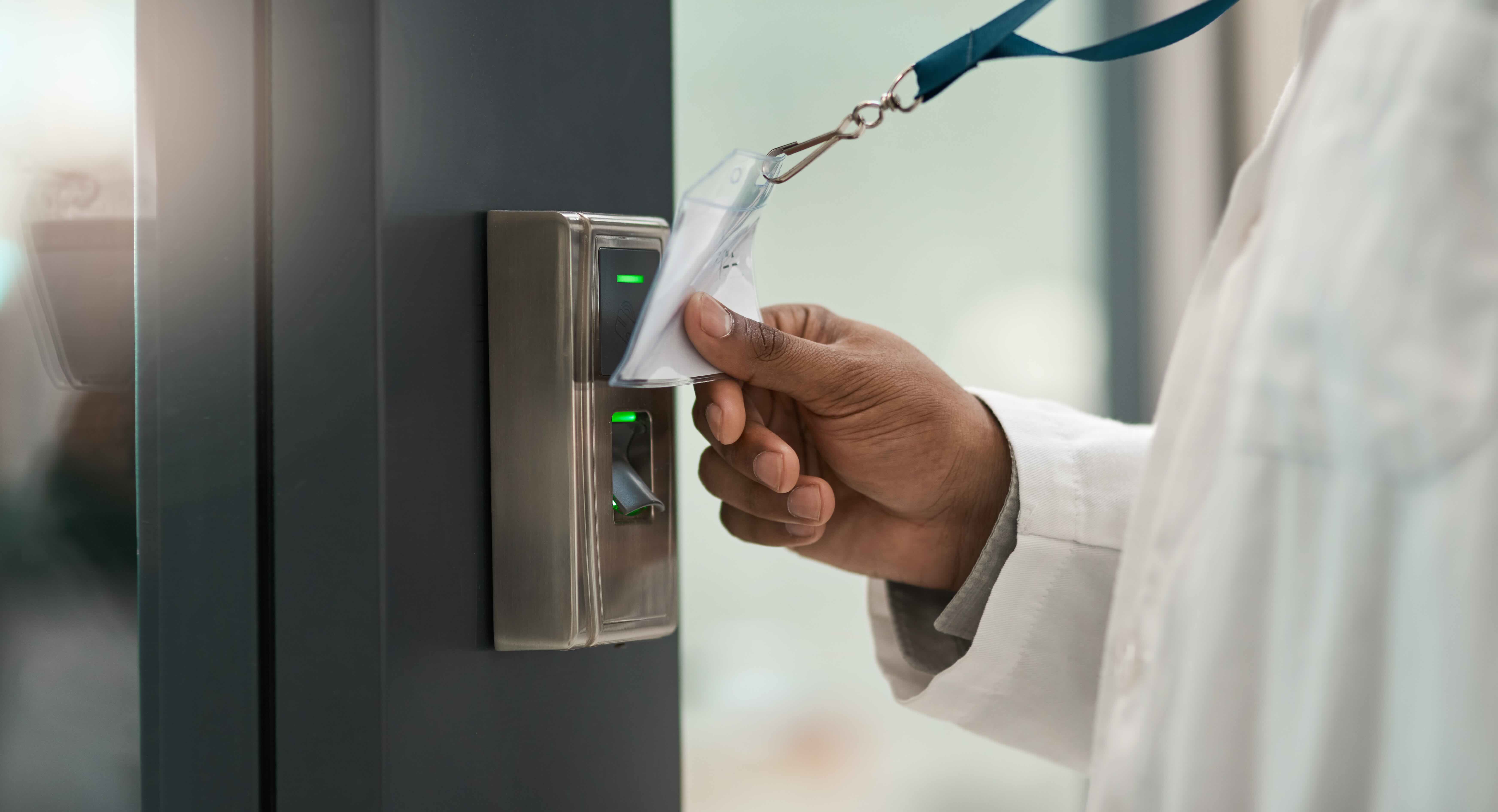 A close-up shot of a scientist using specialized laboratory instrumentation, representing how QReserve restricts access to high-value assets ensuring they are only operated by trained, authorized personnel with active certifications.